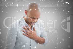 Composite image of casual young man with chest pain