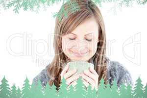 Composite image of smiling woman holding a cup a coffee