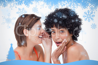 Teenage girl whispering a secret to a surprised friend