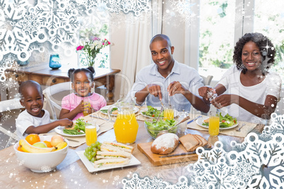 Happy family enjoying a healthy meal together