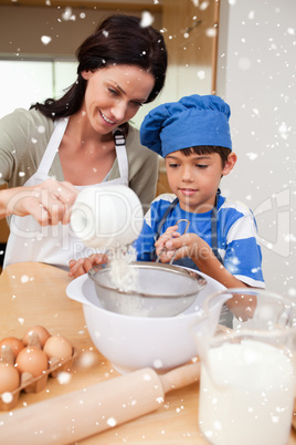 Mother and son preparing dough