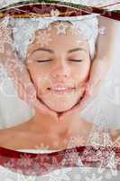Smiling woman having a facial massage