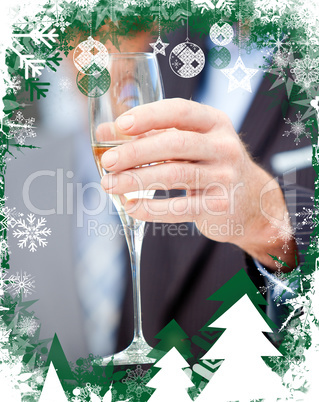 Businessman holding a glass of champagne