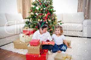 Happy children celebrating christmas at home