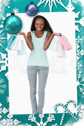 Woman happy about her shopping on white background