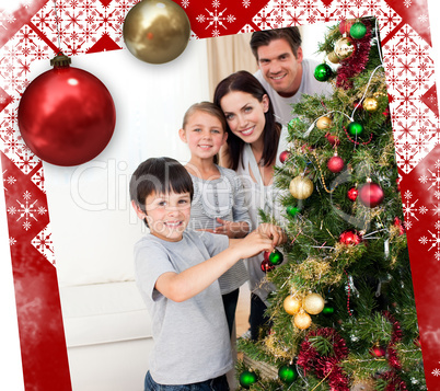 Smiling family decorating a christmas tree