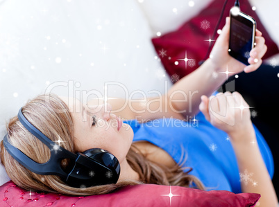 Composite image of woman is listening the music with headphones