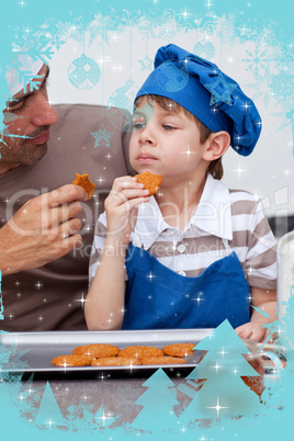 Father and son eating cookies