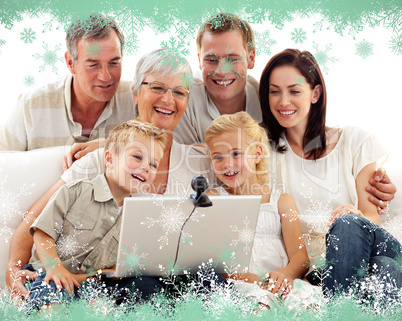 Composite image of happy family in a video conference