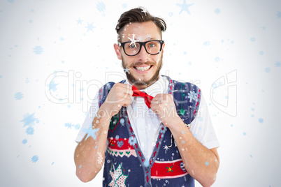 Geeky hipster wearing christmas vest