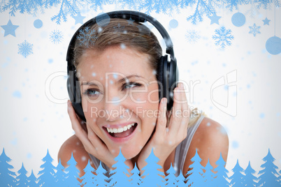 Close up of a smiling woman listening to music