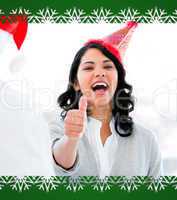 Positive businesswoman doing a thumbup to celebrate christmas