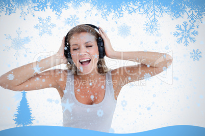 Happy woman singing while listening to music