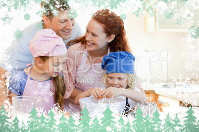 Composite image of happy family enjoys baking together