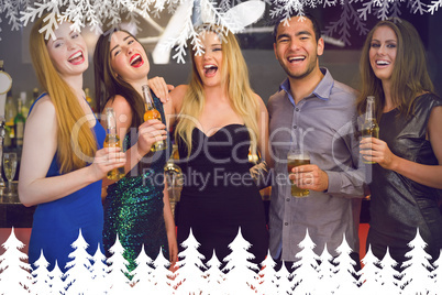 Composite image of laughing friends holding beers posing