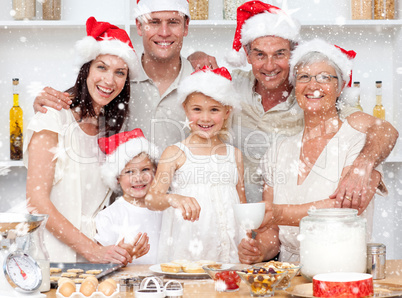 Composite image of children baking christmas cakes in the kitche