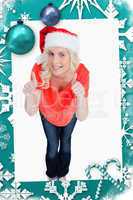Fairhaired woman putting her thumbs up while wearing christmas clothes