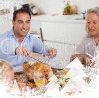 Man carving the thanksgiving turkey