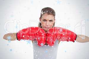 Serious woman with boxing gloves