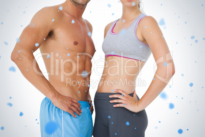 Mid section of a fit young couple Mid section of a fit young couple