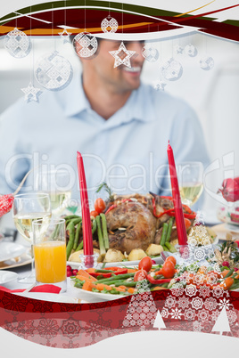 Handsome man having christmas dinner