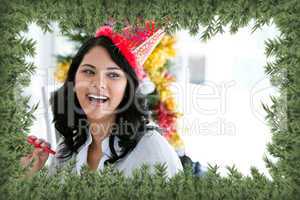 Composite image of positive businesswoman celebrating christmas