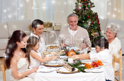 Composite image of brother and sister pulling a christmas cracke