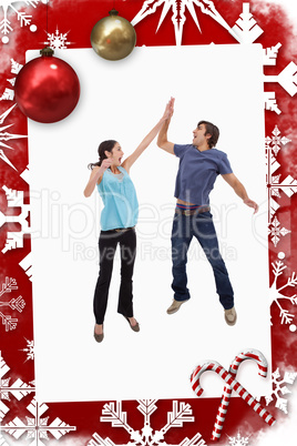 Composite image of portrait of a couple jumping together