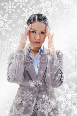 Portrait of a gorgeous businesswoman having a headache