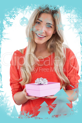Composite image of blonde woman receiving a gift