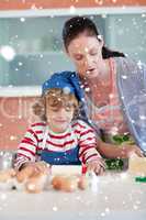 Composite image of beautiful mother and her son baking at home