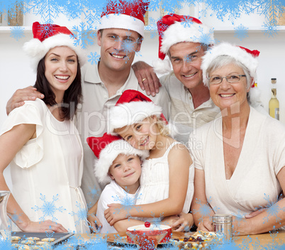 Smiling family baking christmas cakes