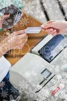 Close up of a teen woman paying with her credit card