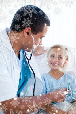 attractive doctor checking the pulse on a young patient