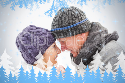 Happy mature couple in winter clothes embracing