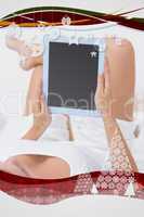 Calm woman touching her tablet pc