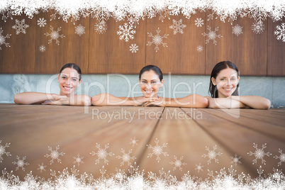 Cheerful young women in swimming pool