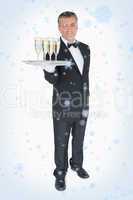 Waiter offering tray with glasses of champagne