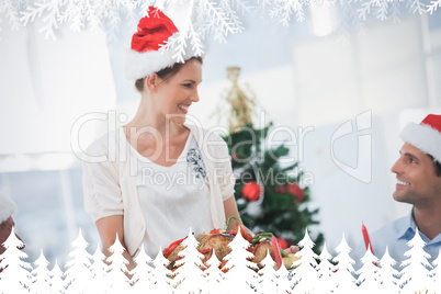 Cheerful woman wearing santa hat and bringing a roast chicken