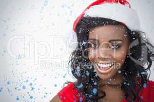 Woman wearing a santa claus hat