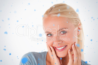 Cute blonde woman smiling at the camera