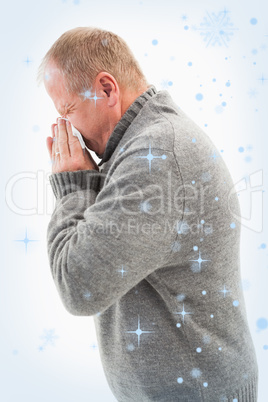 Composite image of sick mature man blowing his nose