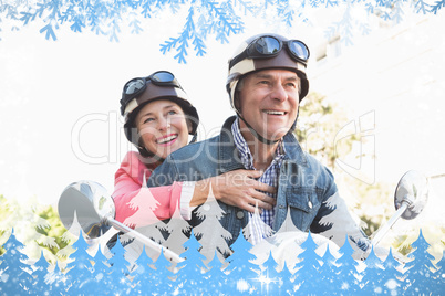 Happy senior couple riding a moped