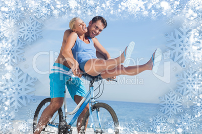 Happy man giving girlfriend a lift on his crossbar