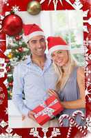Composite image of attractive couple at christmas