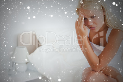 Composite image of tired blonde woman