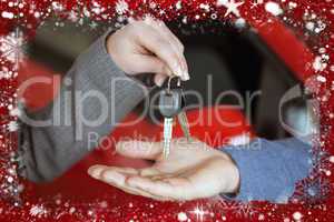 Composite image of person handing keys to someone else