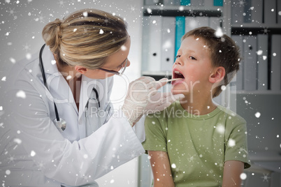 Composite image of doctor checking mouth of boy