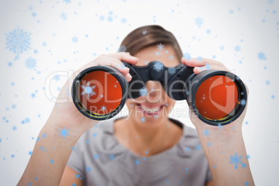 Woman looking through spyglasses