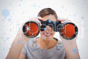 Woman looking through spyglasses